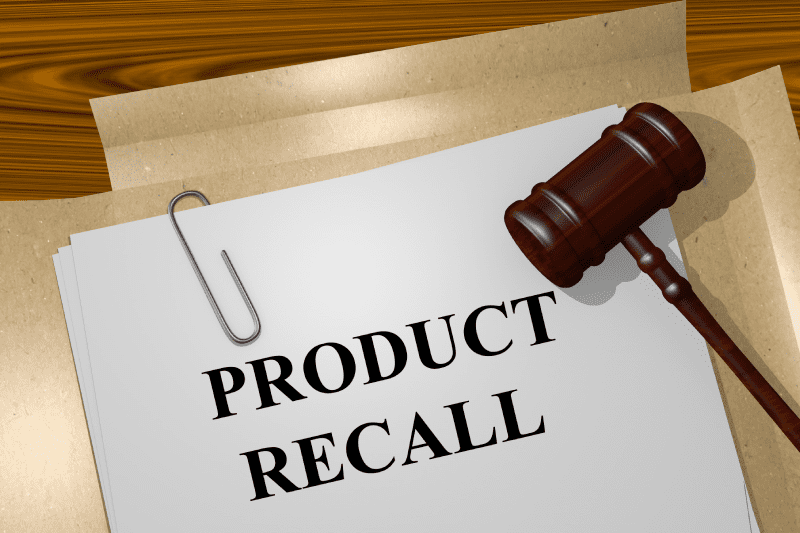 Document titled 'Product Recall' with a gavel on a wooden desk.