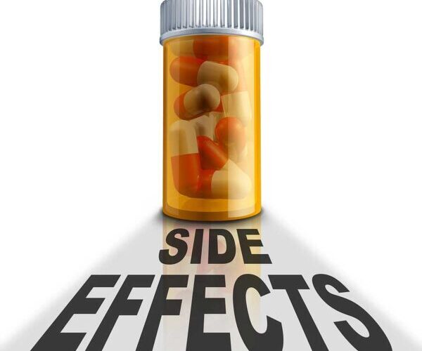 Prescription pill bottle with the words 'Side Effects' in bold beneath it.